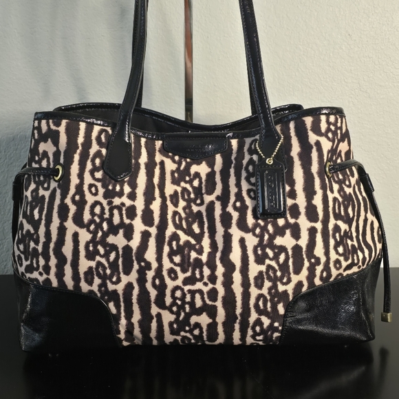 Coach Handbags - COACH Leopard Print Drawstring Shoulder Bag